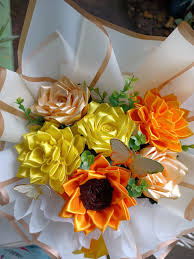 Ribbon sunflower and rose bouquet